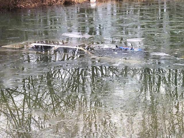 616415_web1_submerged-pick-up-truck