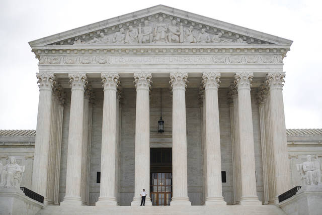 663853_web1_SCOTUSgun