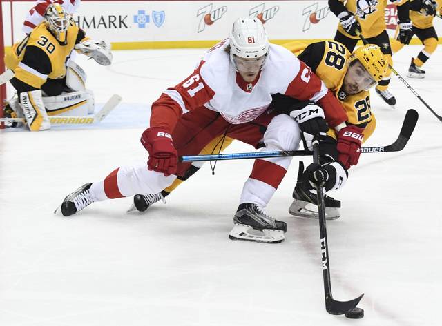 719719_web1_gtr-pens06-122818