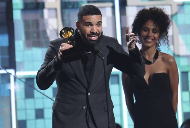 736596_web1_gtr-grammy09-021119