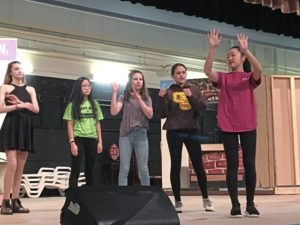Student dance captain Kayla Tai, far right, leads Greensburg Salem High School cast members through a "Mamma Mia!" rehearsal.