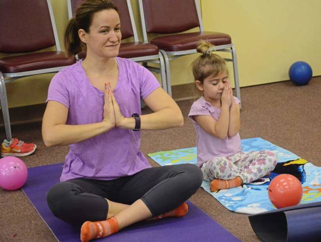 768214_web1_mommy-and-me-yoga