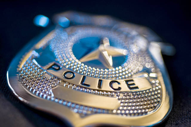 793832_web1_PoliceBadge