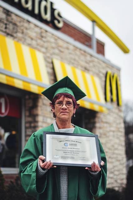 869380_web1_ptr-McDgraduate01-031319