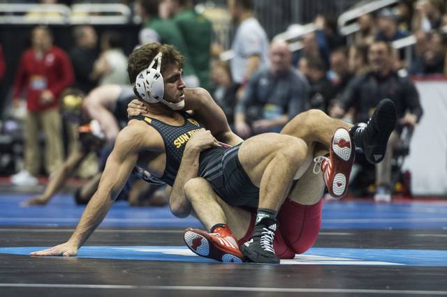 915307_web1_PTR-NCAAwrestle12-032219