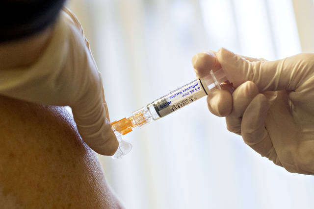 1000405_web1_flu-vaccine-1a93e7f8-cb2f-11e8-a360-85875bac0b1f