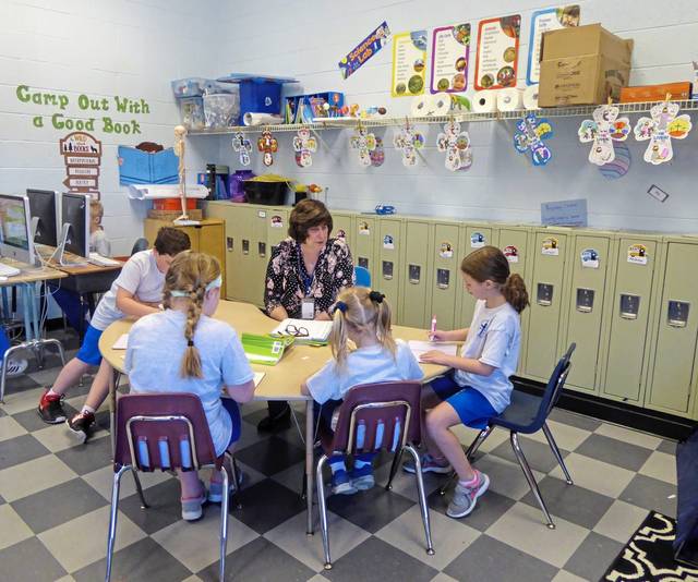 Blessed Trinity Academy teacher honored with Golden Apple Award