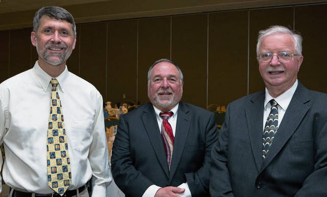 1042424_web1_gtr-OA-businessmen1-042219