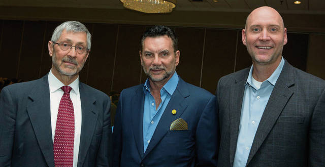 1042424_web1_gtr-OA-businessmen3-042219