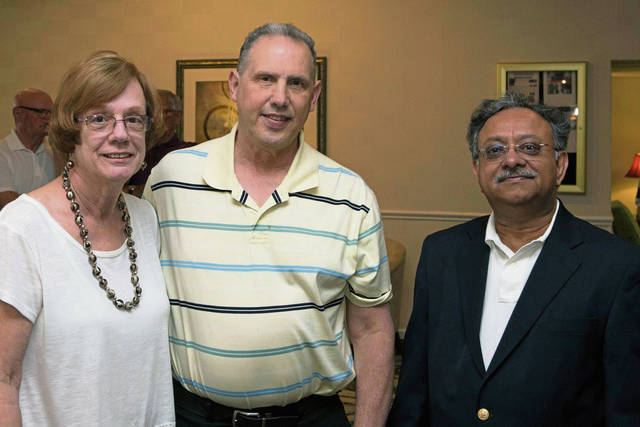 1042424_web1_gtr-OA-businessmen5-042219