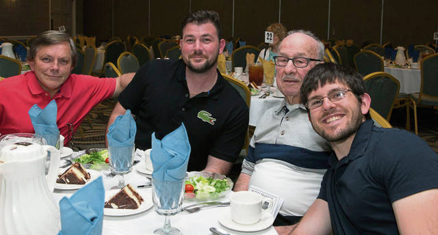 1042424_web1_gtr-OA-businessmen6-042219