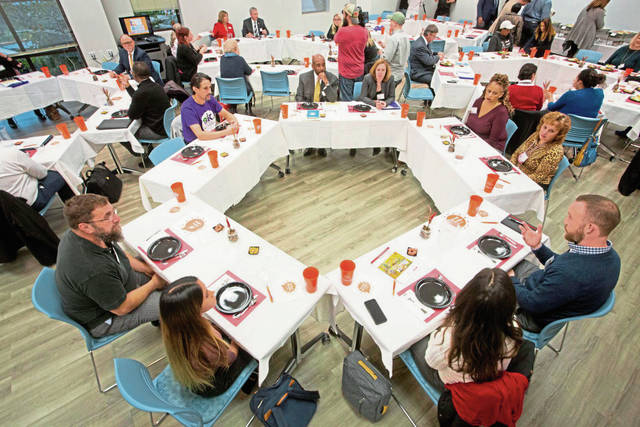 1073738_web1_shr-AroundTheTable02-050219
