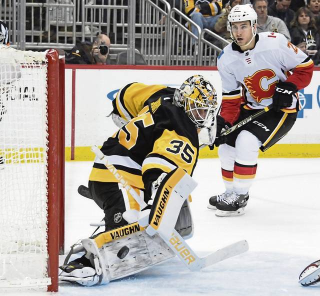 999124_web1_gtr-pens-flames09-030618