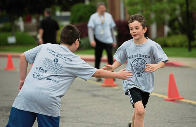 Sewickley’s St. James runs for education