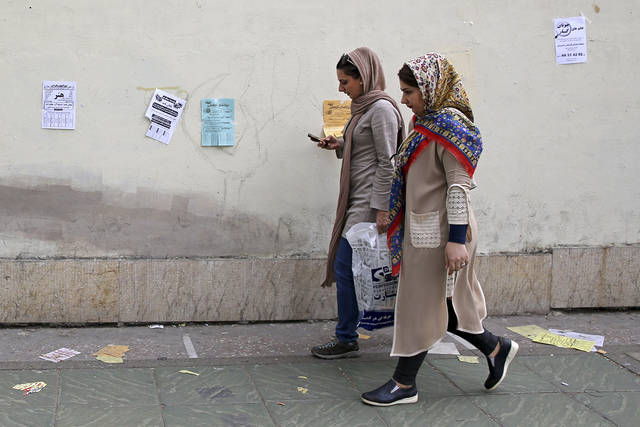 1150373_web1_ptr-iranheadscarf-051419