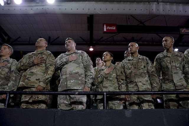 1162219_web1_US-NEWS-MILITARY-IMMIGRANTS-GET