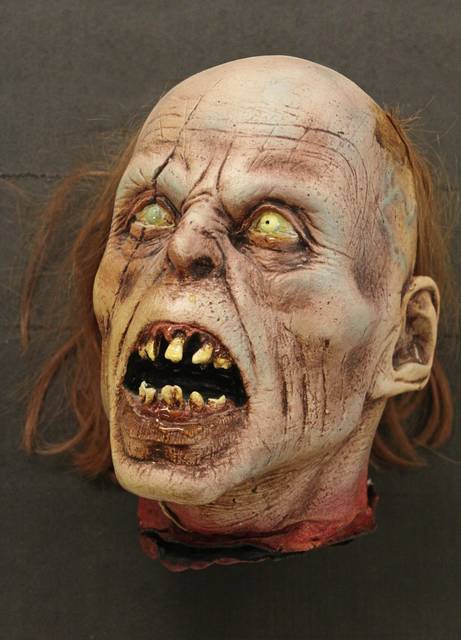 1165219_web1_RomeroHead_2