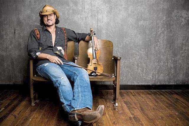 1247724_web1_gtr-chris-higbee-100611