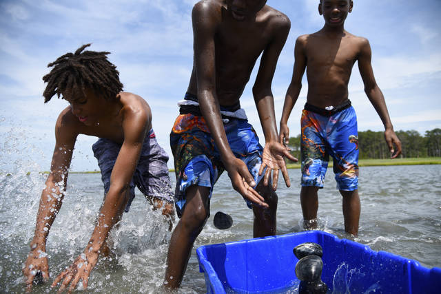 1326650_web1_beach-children-repeat-5b53ea68-94fb-11e9-aadb-74e6b2b46f6a