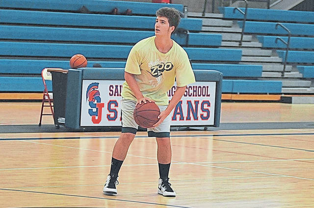 St. Joseph basketball players adjust to new coach, system during summer workouts
