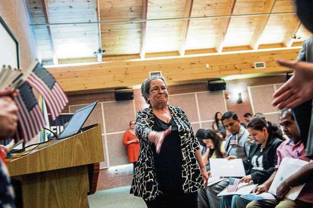 1368271_web1_gtr-newcitizens005-070419