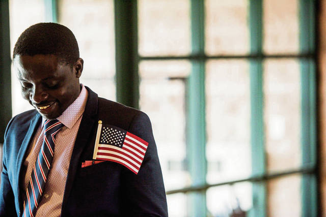 1368271_web1_gtr-newcitizens010-070419