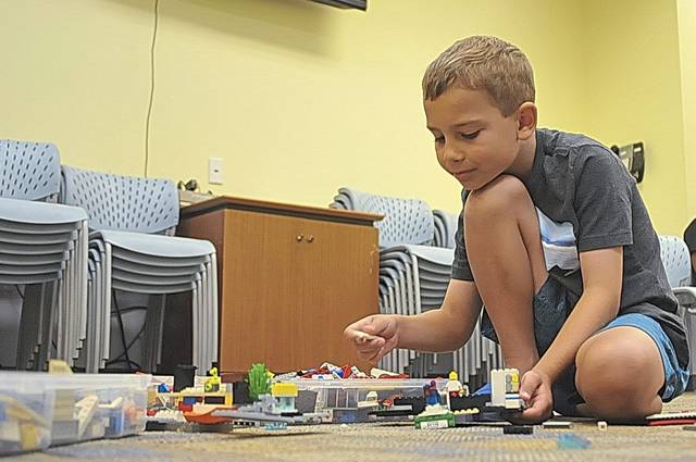 1386378_web1_nj-lo-LegoClub1-071819