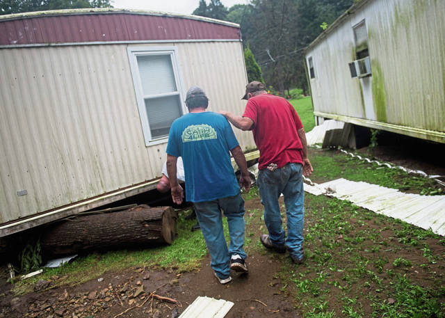 Storms have residents cleaning up after yet another round of flooding