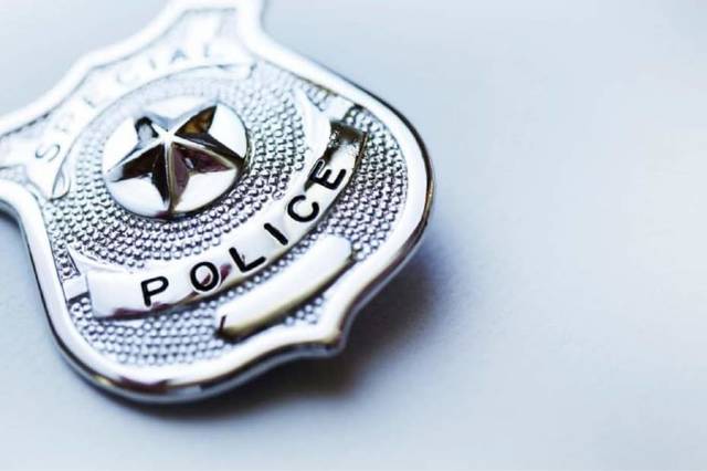 1481025_web1_police-badge
