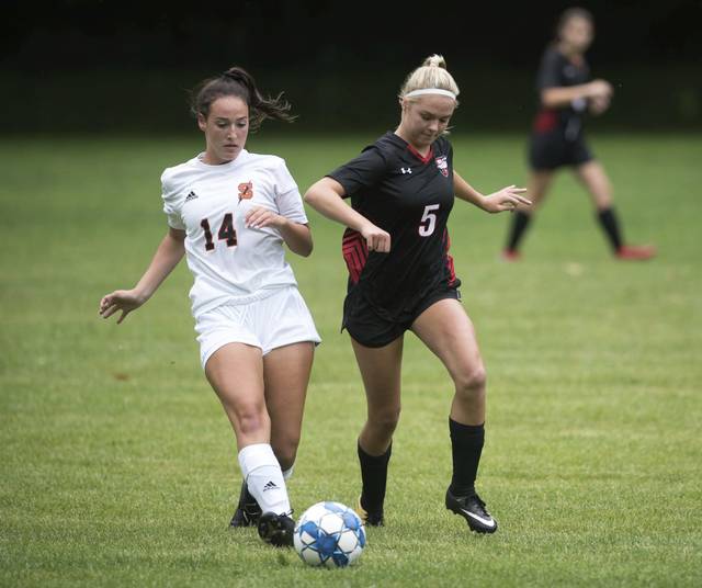 Young Sewickley Academy girls soccer learning on the go