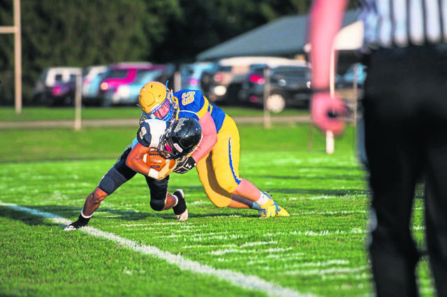 Huss tops 200 yards in Derry’s Big East win against Freeport