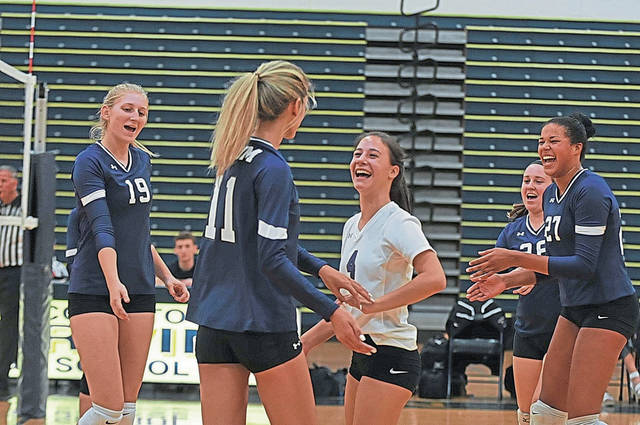 Young Plum volleyball team showing fight