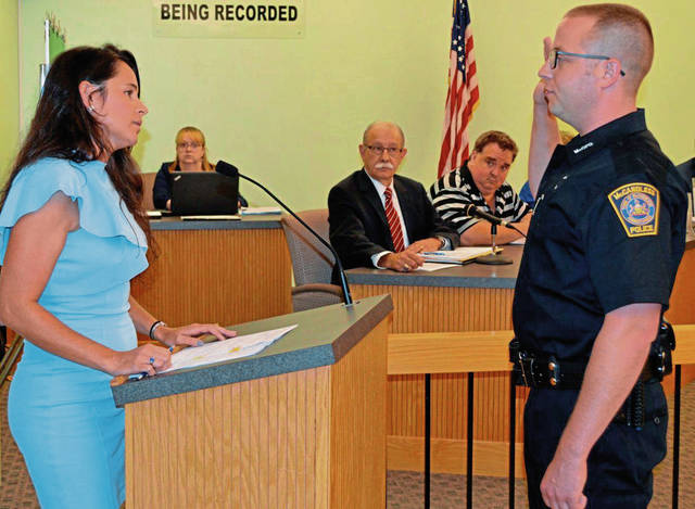 1723511_web1_nj-MacNewCop1-100319