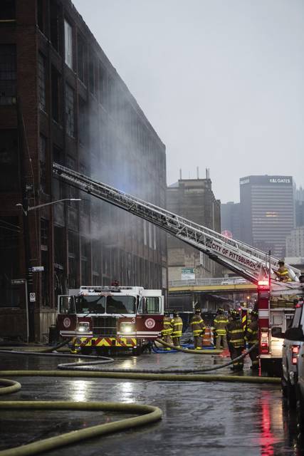 1742355_web1_ptr-stripdistrictfire004-100119
