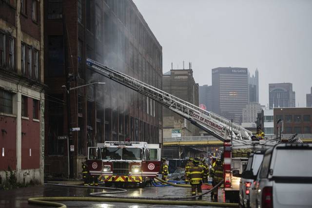1742355_web1_ptr-stripdistrictfire005-100119