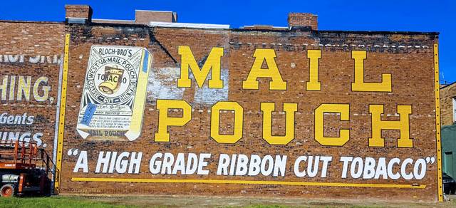 Aspinwall painter revives iconic Mail Pouch tobacco ad on Ford City building