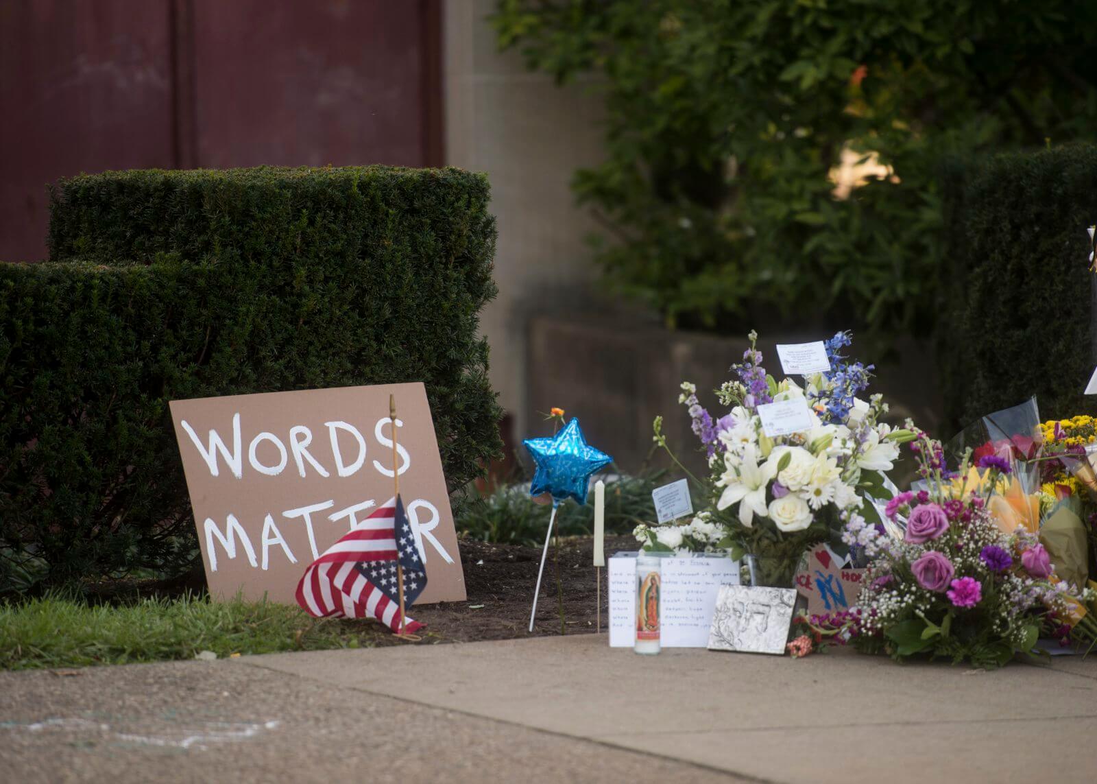 Signs and flowers left at a makeshift memorial outside Tree of Life in Squirrel Hill on Oct. 30, 2018.