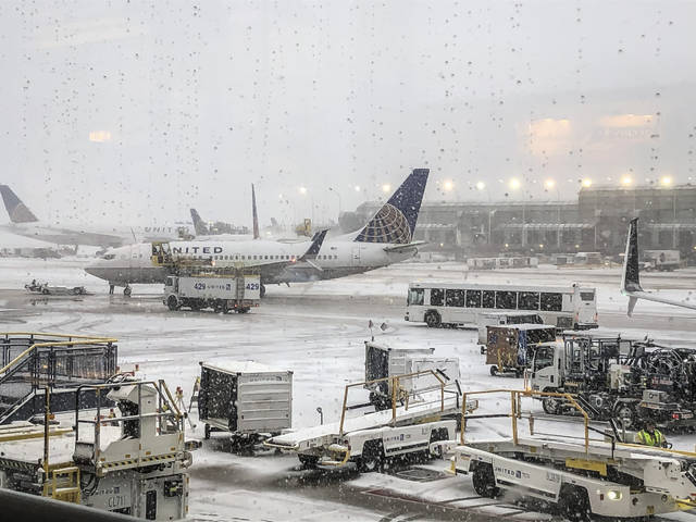 Snow in the Midwest leads to air travel woes in Chicago<span class="headline-video">Video <i class="fa-solid fa-circle-play"></i></span>