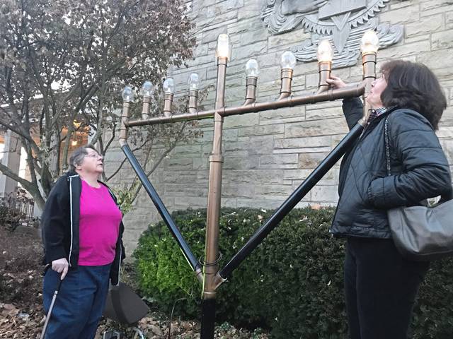 2104184_web1_gtr-GbgMenorah1-122419