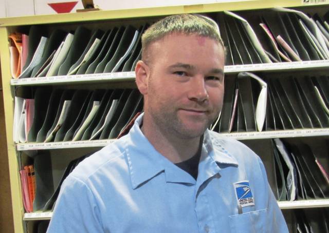 Carrier at post office on McKnight Road honored for heroic efforts on the job