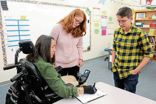 Hampton students make adaptive glove to aid teacher