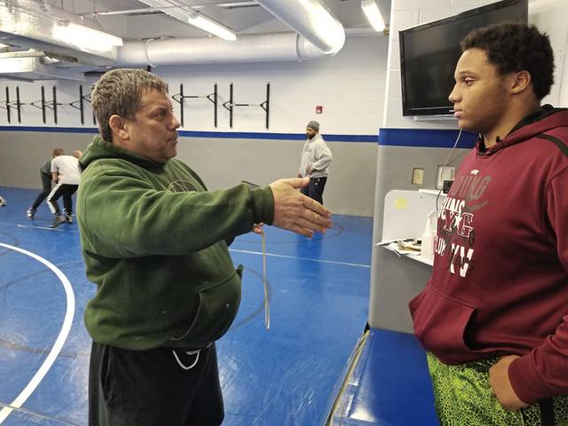 Hempfield reinstates wrestling coach after suspension