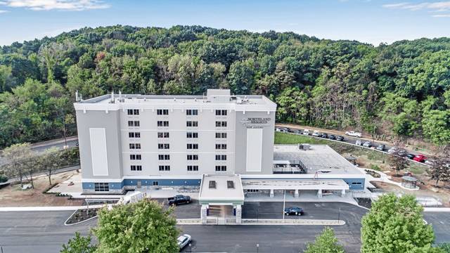 Residents begin moving in to new assisted living community in converted Ross hotel