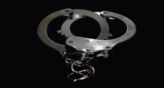 2436063_web1_web-handcuffs-dark