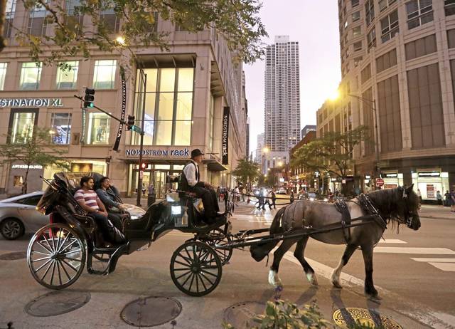 2445502_web1_ptr-tns-Horse-drawn-031320