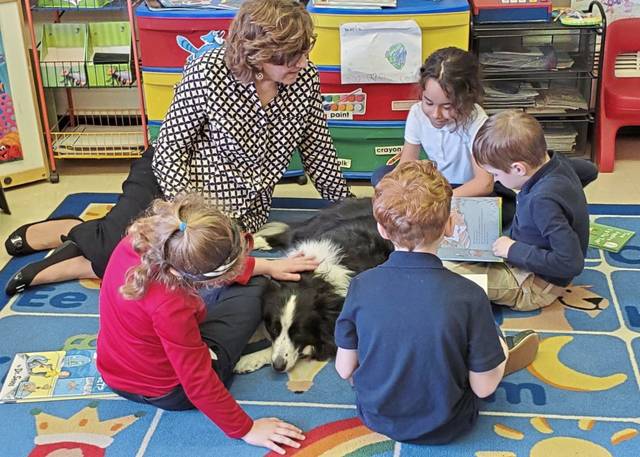 Blessed Francis Seelos Academy students enjoy reading with ‘Tail Waggin’ Tutors’