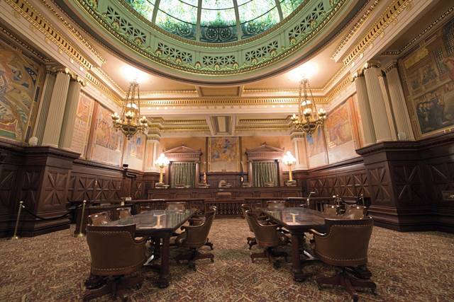 State Supreme Court temporarily bans residential evictions, reduces state court functions