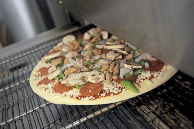 2560294_web1_ptr-DominosPizza-041720