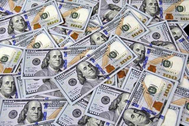 2596292_web1_WEB-100-dollar-bills-money