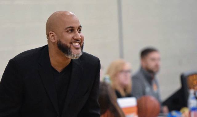 Radio station. Food truck. Dance studio? Jamal Woodson’s energy earns him Baldwin basketball job